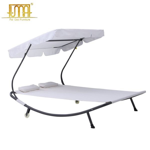 Sun lounger with canopy