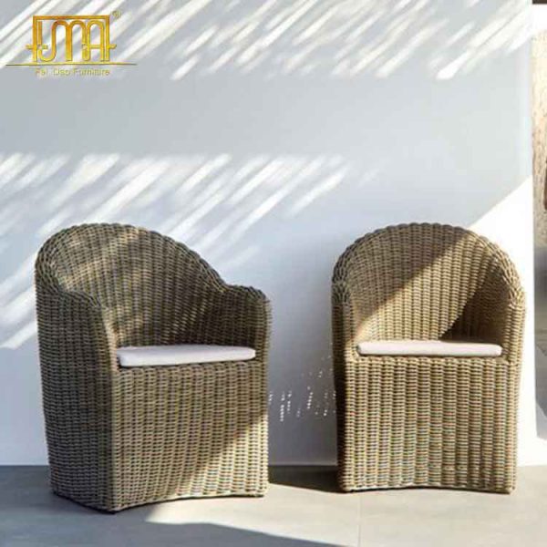 Wicker garden chair with armrests